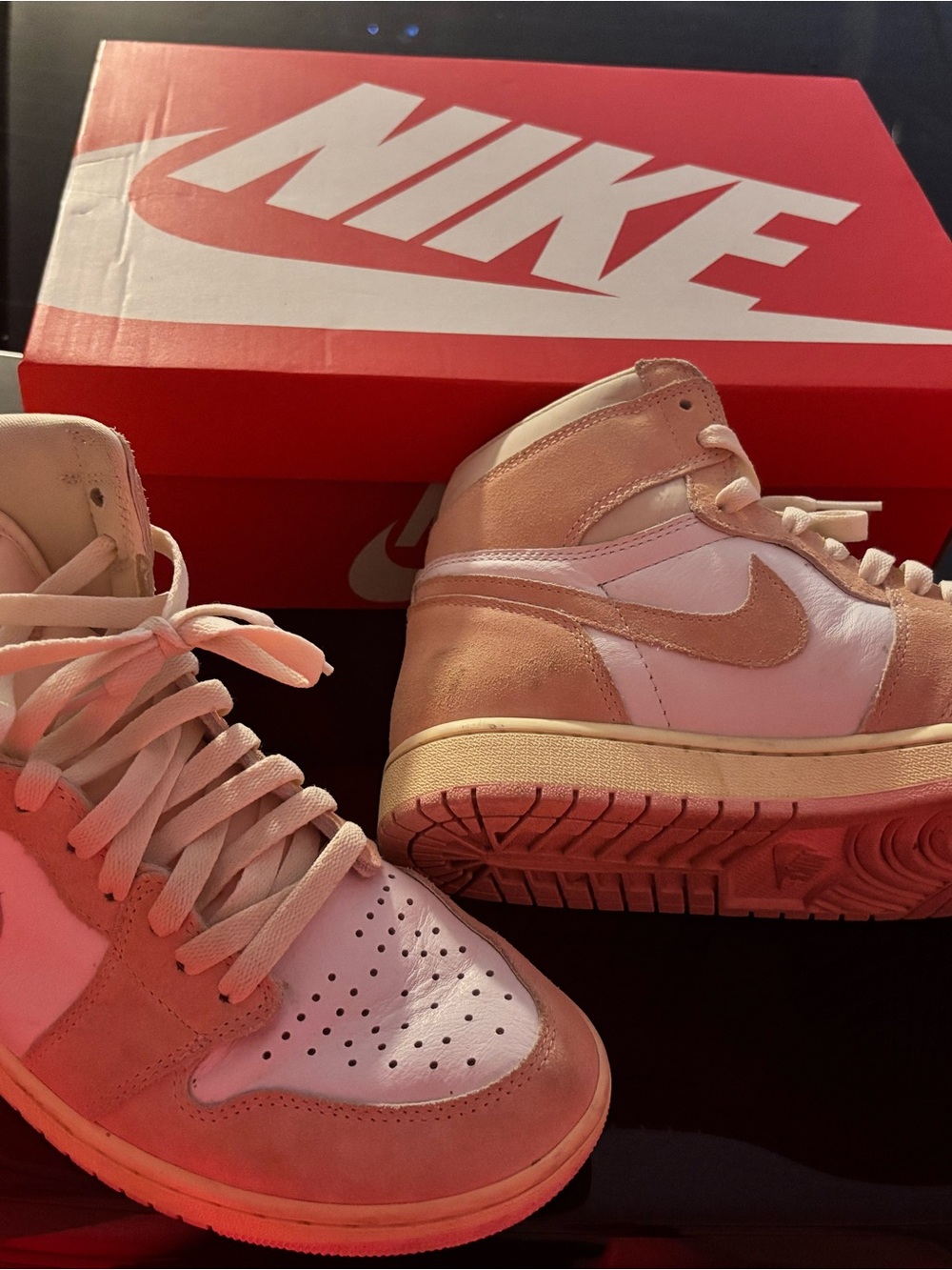 Nike Jordan 1 Retro Women’s High-Top Sneakers in Pink and White